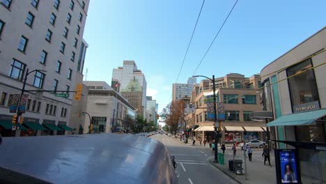 Footage-from-the-roof-of-the-car-on-traffic-road-and-buildings-in-the-surrounding-area-in-Seattle