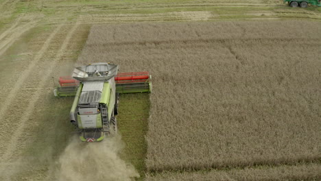 Harvester-combine-finishing-a-lane-of-grain--wheat