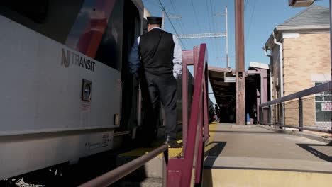 Young-Caucasian-lady-student-catching-the-waiting-train-home-in-the-evening