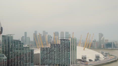 Aerial-View-of-O2-Arena-and-Canary-Wharf,-from-Emirates-Cable-Car,-IFS-Cloud-Car,-London