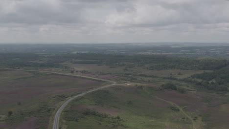 New-Forest-Drone-Aerial-Shot-Panning-Up-in-English-Countryside-on-a-Cloudy-Day