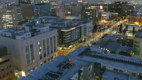 Downtown-Los-Angeles-|-11th-and-Olympic-|-Evening-|-Highrise-Lofts-|-Low-Overhead-Aerial-Shot