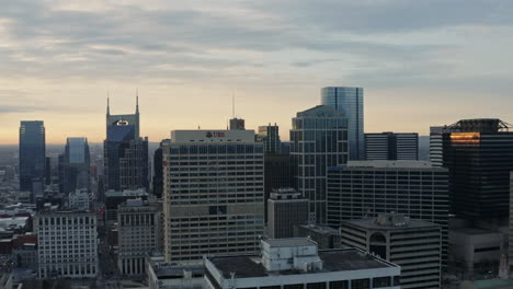 Aerial-over-downtown-Nashville-Tennessee-cityscape-in-early-morning,-4K