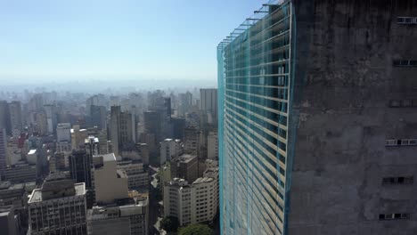 Aerial-view-around-the-exterior-of-the-Edifício-Copan-building,-in-Sao-Paulo,-Brazil