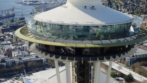 Drone-orbiting-viewing-platform-and-deck-on-The-Space-Needle,-Seattle