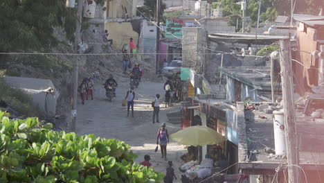 People-walking-down-neighborhood-road-in-Petion-ville-neighborhood