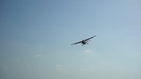 A-shipping-DHL-plane-landing-on-a-runway-on-Maho-Beach-St