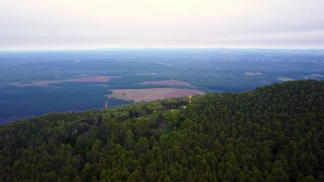 Aerial-footage-of-the-memorial-cross-on-Mount-Macedon,-central-Victoria,-Australia