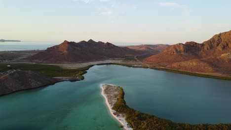 Aerial-view-of-Playa-Balandra,-Mexico,-during-golden-hour