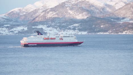 Hurtigruten-Voyage-Sailing-In-The-Fjord-With-Mountain-Landscape-Near-Indre-Fosen-In-Norway