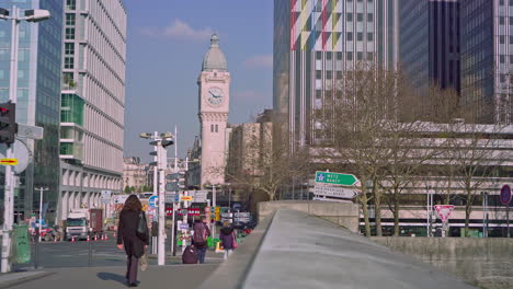 A-view-of-the-clock-tower-of-Gare-de-Lyon-train-station-in-Paris-from-the-bridge-Charles-de-Gaulle-on-a-bright-sunny-day-at-noon