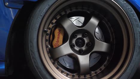 Close-Up-of-Steel-Wheel-Rim,-Brembo-Brakes-and-Tire-on-Luxury-Sports-Car