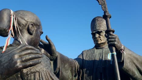 Statue-of-Aron-Marton-Catholic-Bishop-administering-confirmation-to-szekler-girl