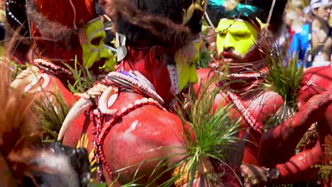 Slow-motion-Huli-Wigmen-warriors-jump-in-traditional-dance,-New-Guinea