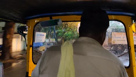 A-rickshaw-driver-is-driving-in-the-streets-of-Agra-in-India