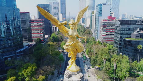 Aerial-drone-footage-of-the-Independence-Monument-in-Mexico-City-showing-the-statue-of-the-Angel-de-la-Independencia-and-the-Reforma-Avenue