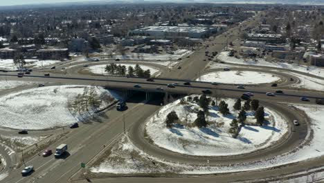 Orbiting-drone-shot-of-a-circular-bridge-highway