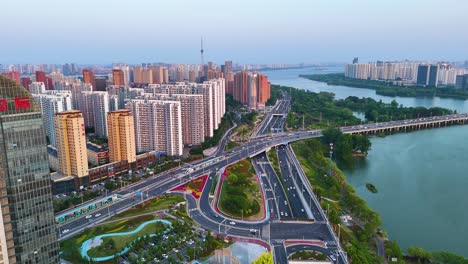 Aerial-view-of-Linyi-City,-Shandong-Province,-at-sunset