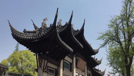 Longhua-Temple-in-Shanghai,-China-at-sunny-day,-vertical-panning-shot