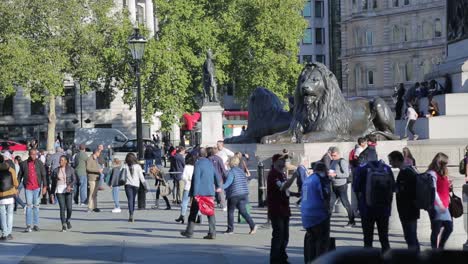 Trafalgar-Square-lions,-London,-England,-climbing-ban