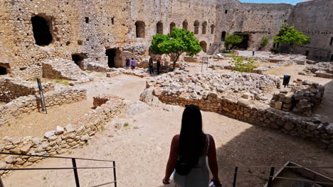 Visiting-the-Chlemoutsi-Castle-Museum-in-Kastro-Kyllinis,-Greece---entering-the-courtyard-reveal