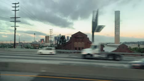 Early-morning-drive-past-downtown-Los-Angles-skyline