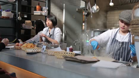 Chinese-restaurant-staffers-prepare-fresh-Chinese-food-in-central-London