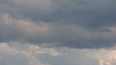 Timelapse-of-Gray-Clouds-Drifting-Across-the-Sky