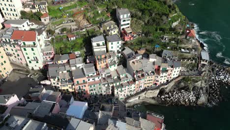 Riomaggiore-Cinque-Terre-Italy-aerial-overhead-of-the-busy-village-core