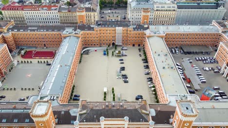 Amazing-aerial-cityscape-view-of-Vienna,-Austria,-with-buildings,-car-parked-and-public-transport