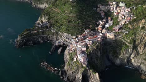 Manarola-Cinque-Terre-Italy-aerial-cinematic-view-of-cliffside-village