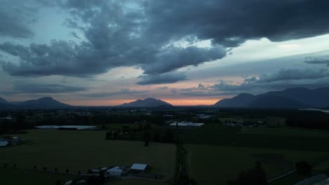 Farmland-and-Valley-surrounded-by-Mountains