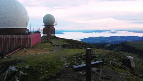 A-breathtaking-view-of-the-Grosser-Speikkogel-weather-station,-featuring-its-iconic-radar-dome-and-surrounding-mountain-landscape