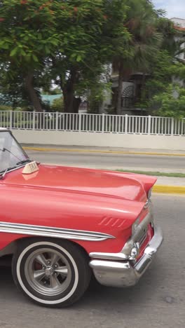 Chevrolet-Biscayne-1958-vintage-American-car-in-Varadero,-Cuba,-vertical-video-in-slow-motion