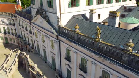 Famous-Esterhazy-Castle,-Fertod,-Hungary-exterior-view,-Palace-design-and-clock