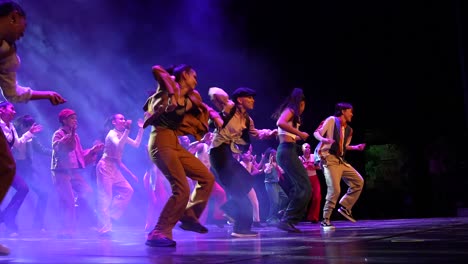 Young-Hispanic-Boys-and-Girls-Dancing-On-Stage-Slow-Motion