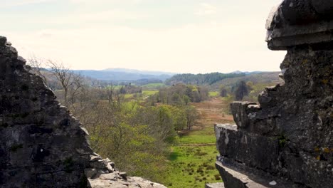 Scenic-landscape-view-from-Carnasserie-Castle-16th-century-tower-house-over-rural-countryside-of-Argyll-and-Bute-in-western-Scotland-UK