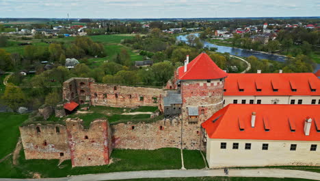 Bauska-Castle-and-palace-aerial,-old-medieval-fortification-walls,-Latvia