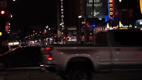 Night-Traffic-on-Hollywood-Boulevard,-Los-Angeles,-California-USA,-Slow-Motion