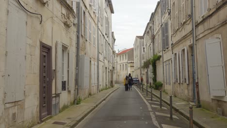 Profile-view-of-a-medieval-Historic-center-in-La-Rochelle,-France-during-daytime