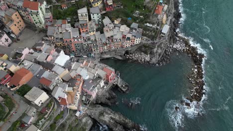 Riomaggiore-Cinque-Terre-Italy-aerial-high-view-descending-down-closeup