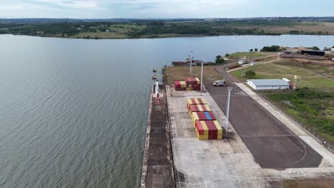 An-impressive-orbiting-drone-shot-of-the-shipping-containers-at-Posadas-Port