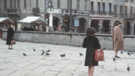 Pedestrians-Walk-Past-Pigeons-in-Square-in-the-Downtown-in-Padua-in-1950s