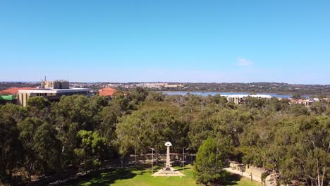 Aerial-rise-up-over-Central-Park,-to-reveal-Joondalup-Lake-in-background---Perth
