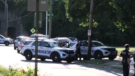 Columbus-Police-officers,-fully-armed-form-a-barracade-around-an-apartment-searching-for-a-male-criminal