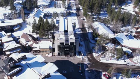 Olympic-Valley,-Lake-Tahoe-Ski-Resort,-California-USA,-Drone-Shot-of-Aerial-Tram-Station-Building-on-Sunny-Winter-Day