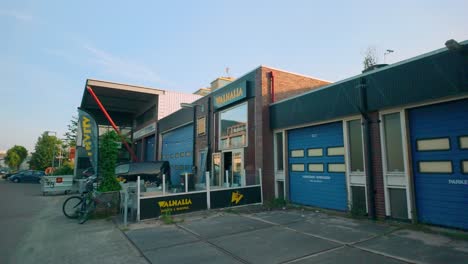 Footage-of-the-Walhalla-Amsterdam-beer-brewery-facade,-located-in-a-converted-garage-in-Amsterdam-Noord