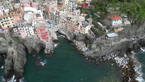 Riomaggiore-Cinque-Terre-Italy-aerial-overhead-quick-view-of-village-cove