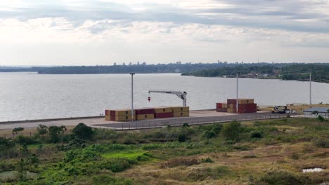 Orbiting-drone-shot-of-the-containers-at-Posadas-Port