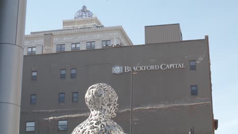 Four-Elements-statue-and-view-of-Blackford-Capital-building-in-downtown-Grand-Rapids,-Michigan-with-stable-video-shot